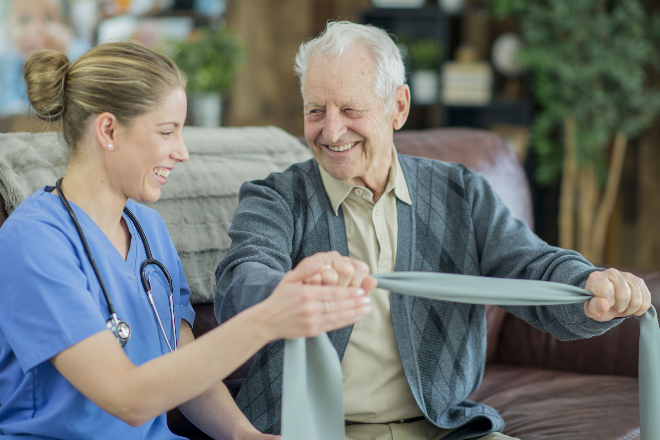 Nurse working with older man